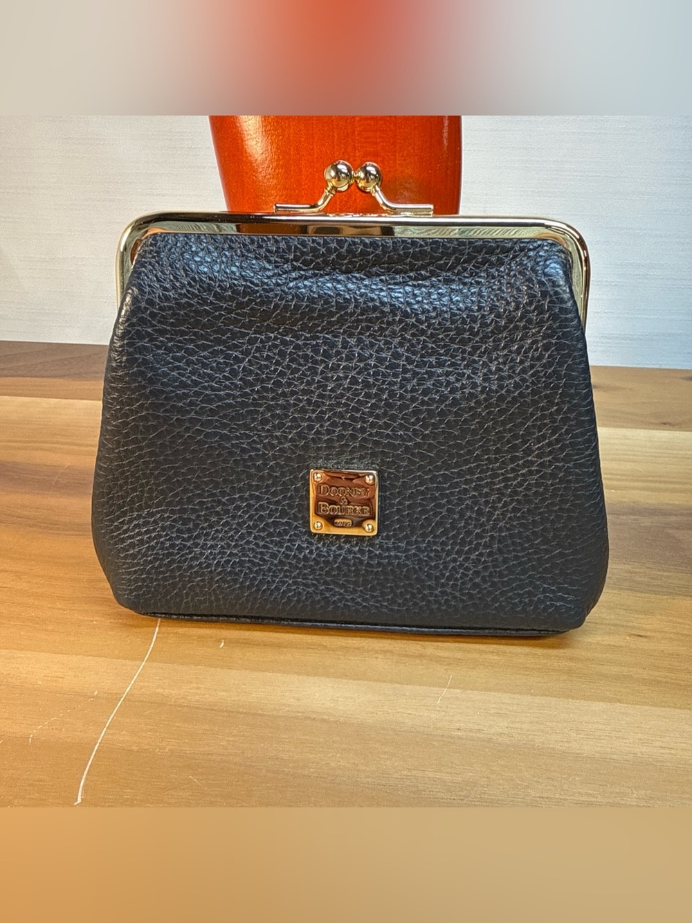 Dooney and Bourke Pebble Grain Leather Navy Blue Frame Kiss Lock Coin Purse